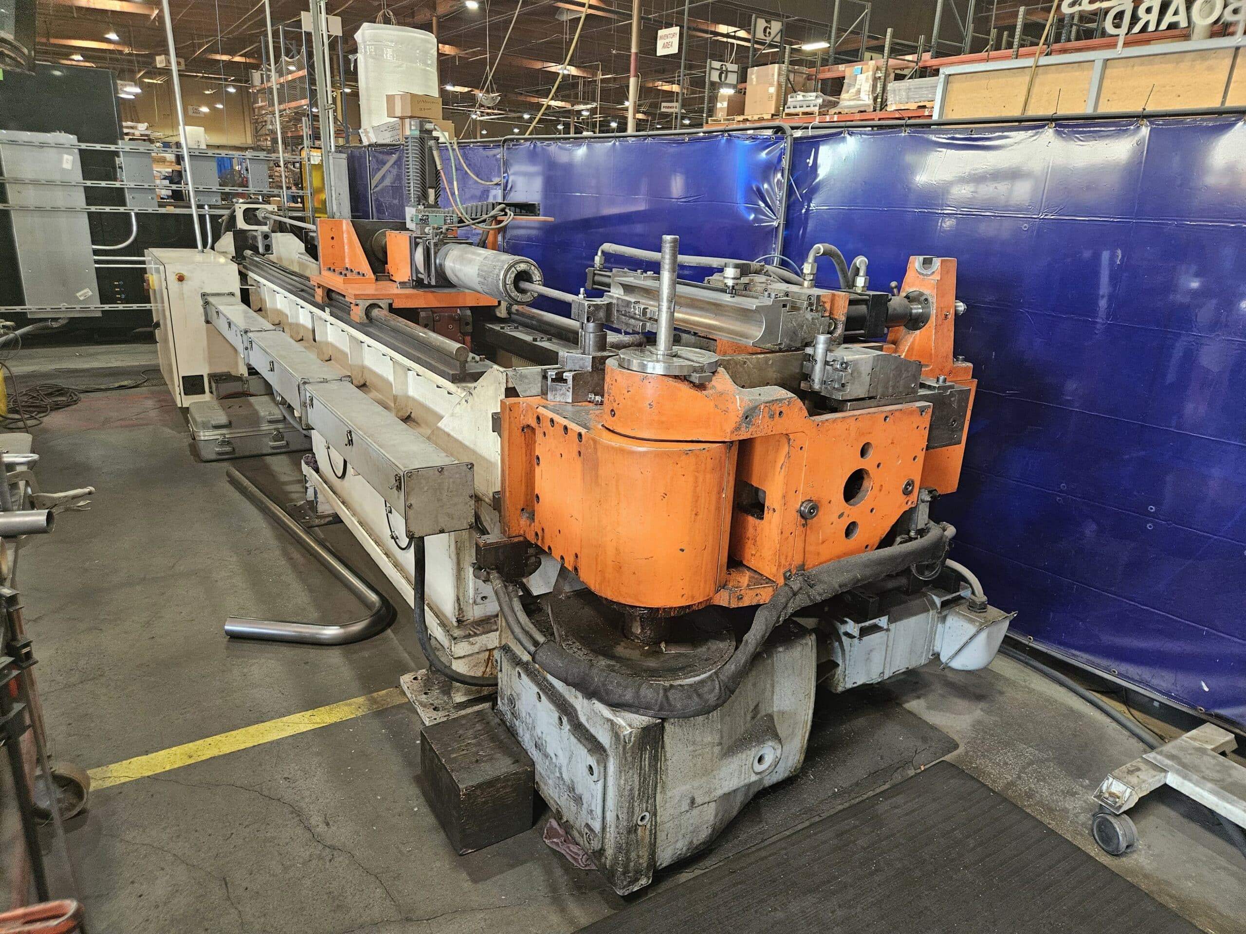 CNC tube bending machine and bending tooling